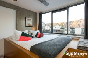 a bedroom with a large window